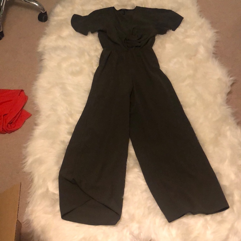 green jumpsuit